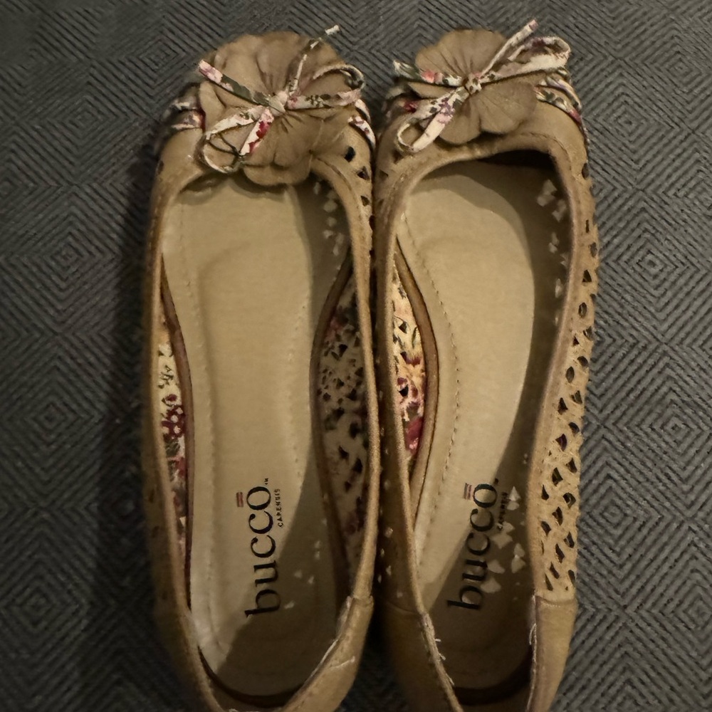 Bucco peep toe flats